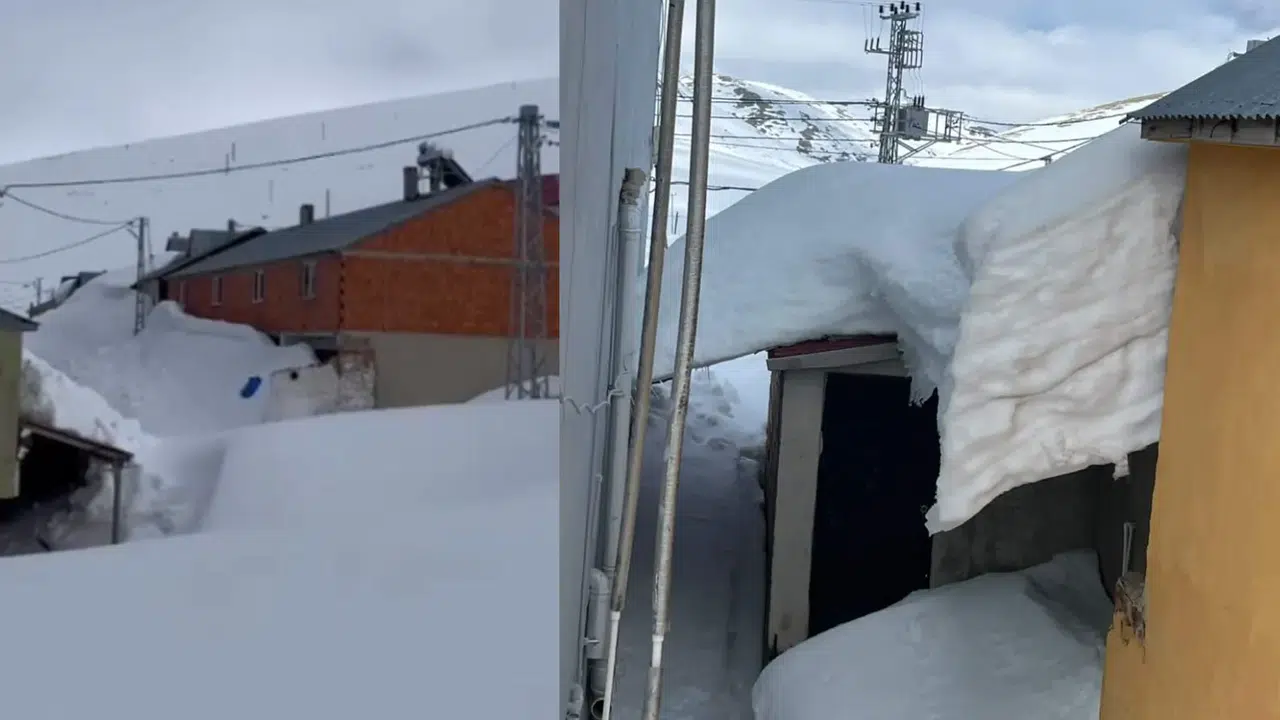 Kazıkbeli Yaylasında kar boyu evleri aştı